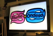 Decorative graphic of computer screen showing the Studio-Ondesq.com logo.
